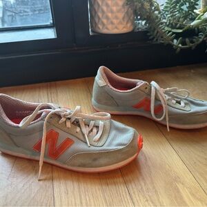 New Balance Women's Sneakers in Gray with Orange Accents